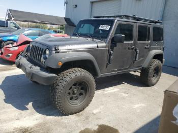  Salvage Jeep Wrangler